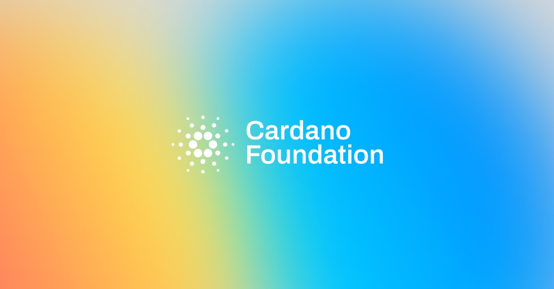 Cardano Foundation logo over a rainbow gradient.