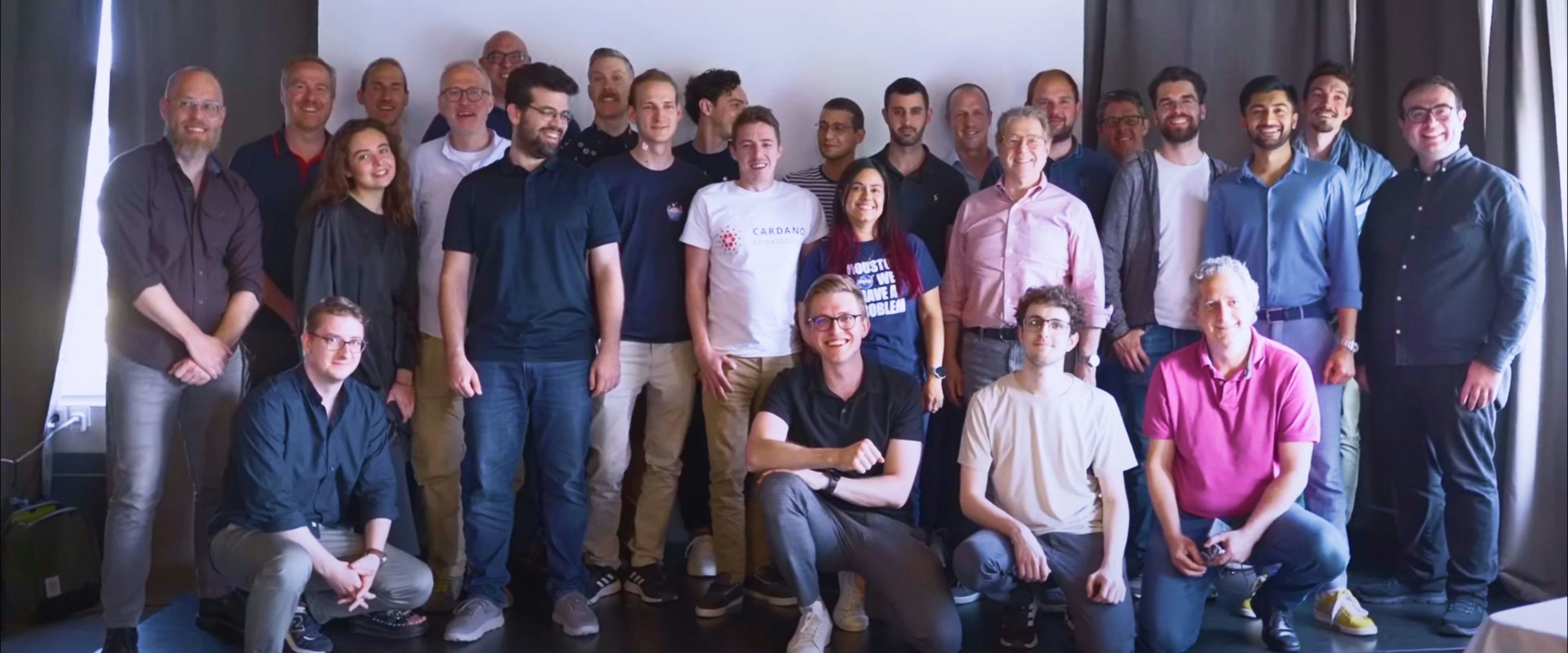 A photograph of Cardano community members all together.